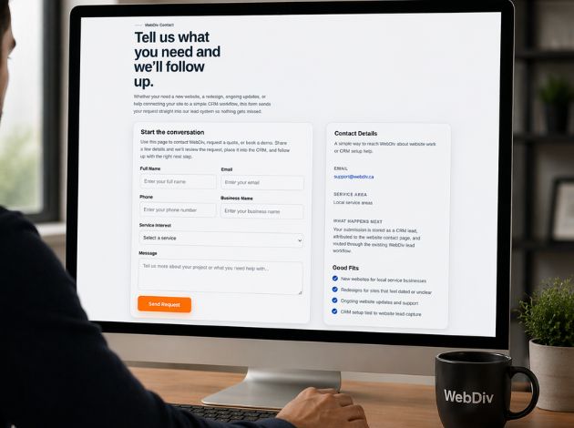 Local business owner viewing a website contact form and CRM lead system on a desktop computer